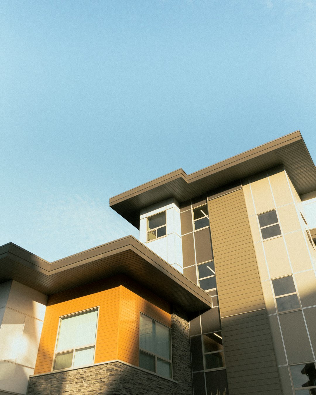 white and brown concrete building under blue sky during daytime