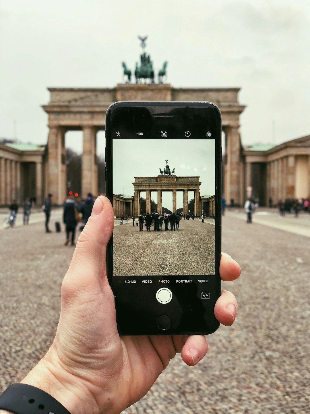 person holding space gray iPhone 6
