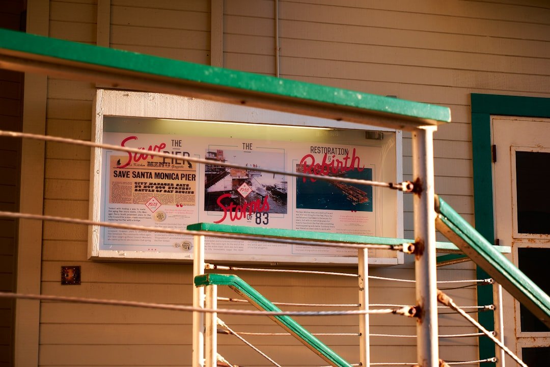a sign on a railing