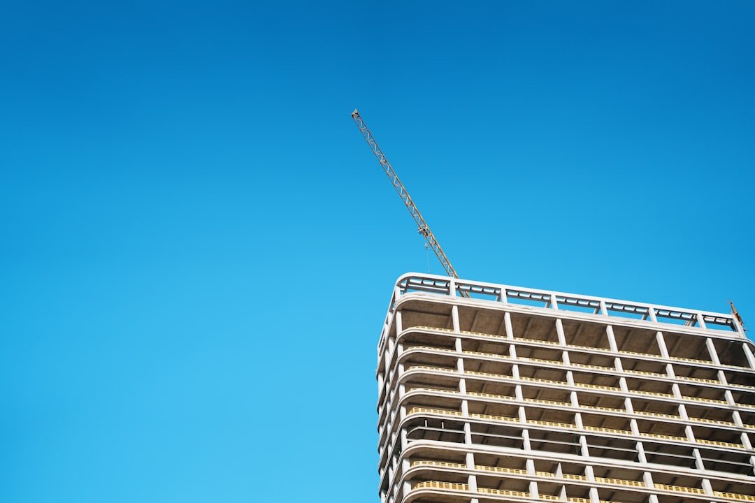 A tall building with a blue sky in the background