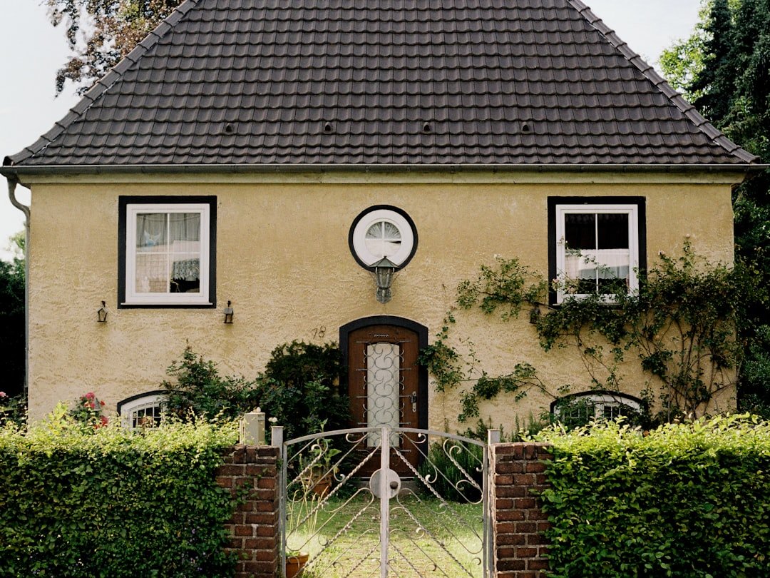A house with a clock on the front of it