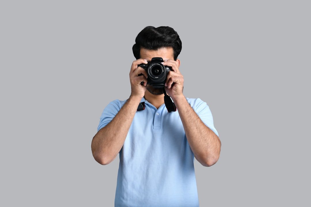 a man holding a camera