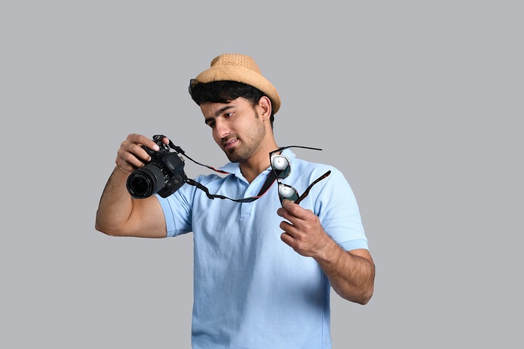 a man holding a camera