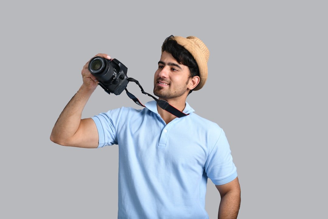 a man holding a camera
