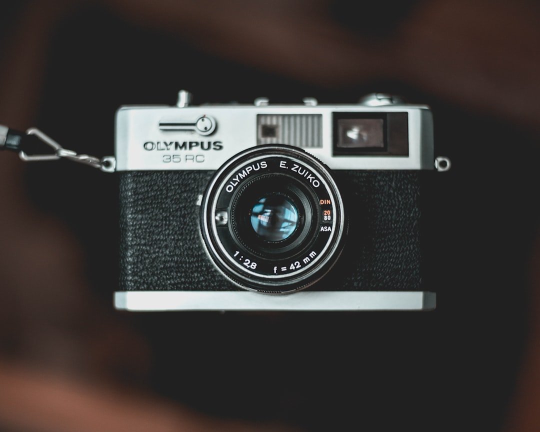 black and gray Olympus 35 RC camera