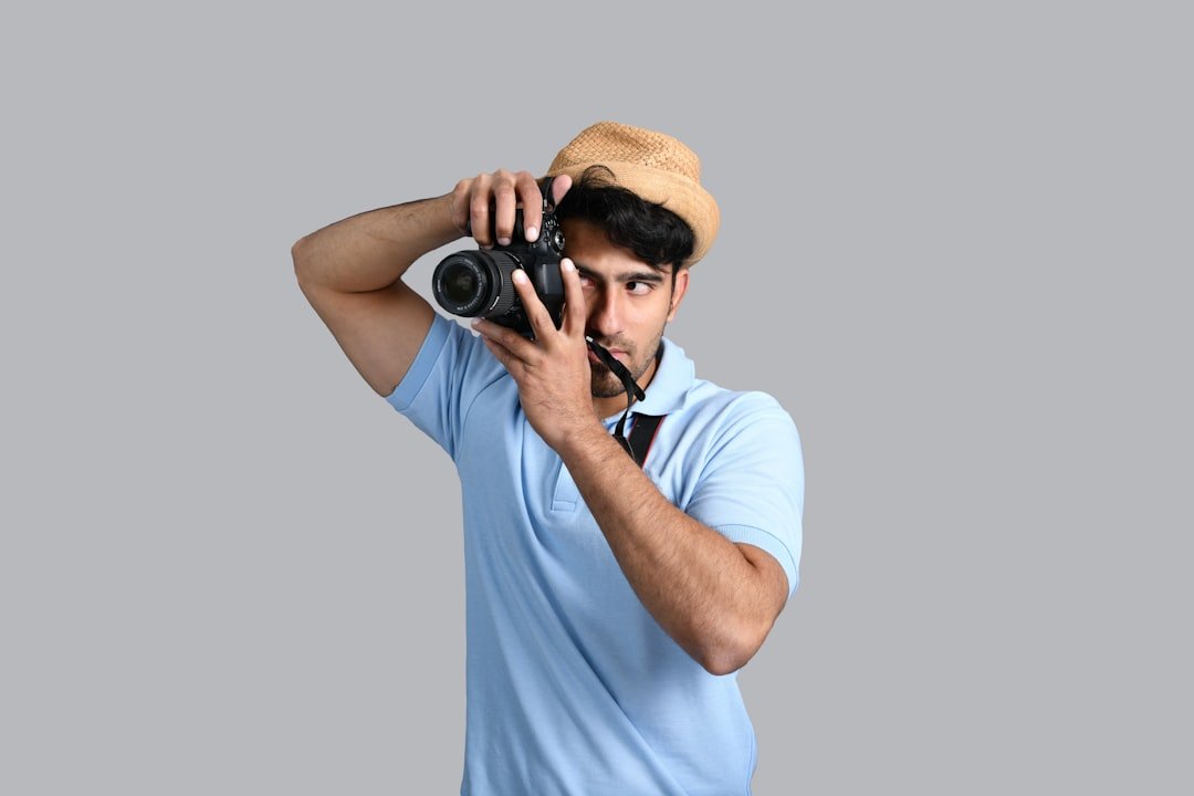 a man holding a camera
