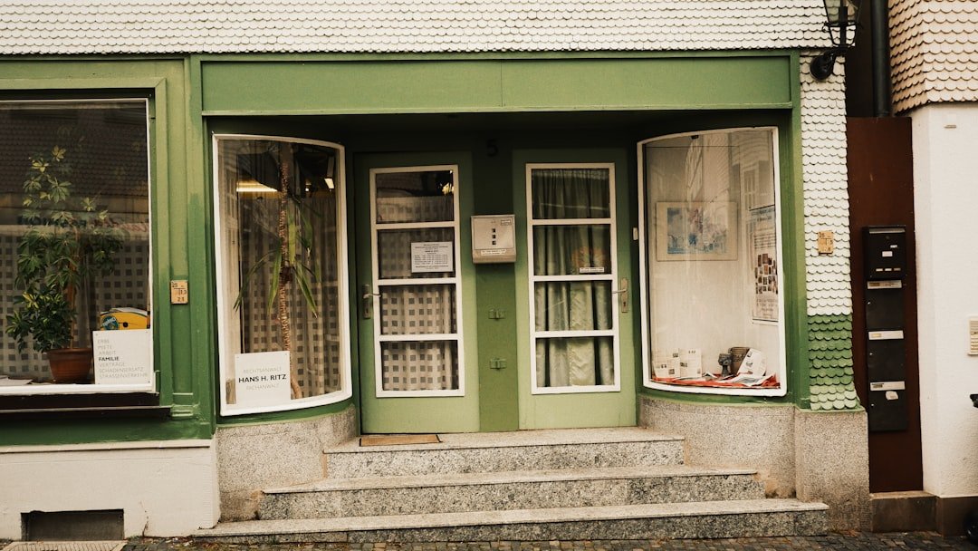 white and green wooden window frame