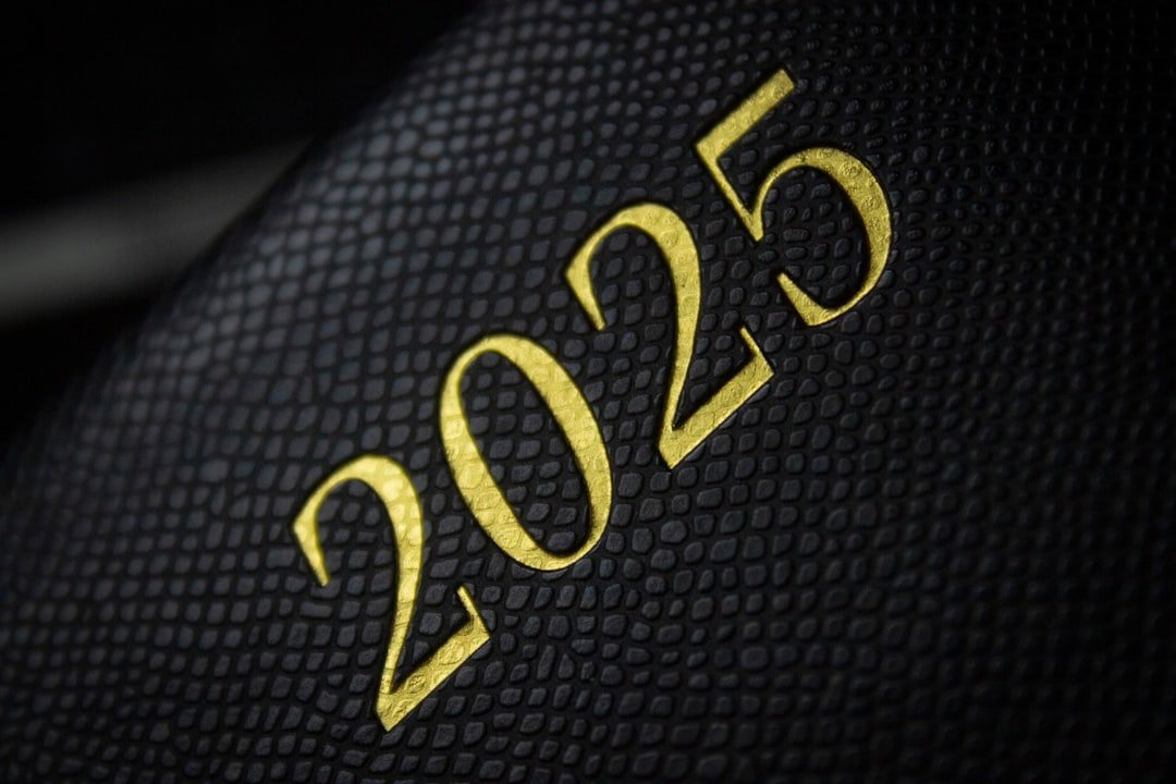 A close up of a black and gold cover of a book