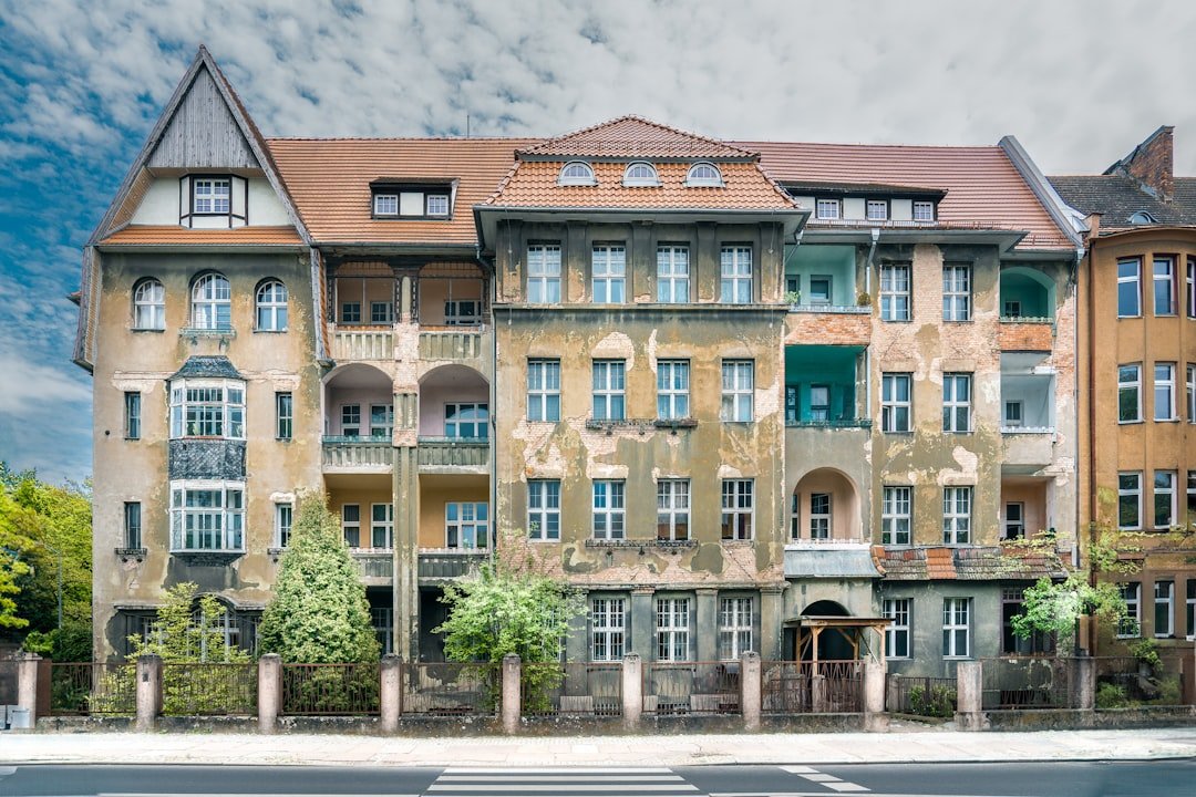 an old building with many windows and balconies