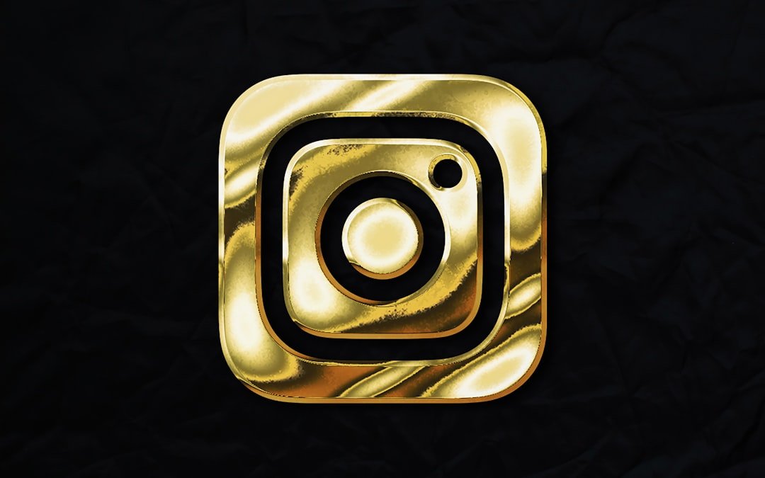 a gold instagram logo on a black background
